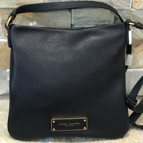 Marc Jacobs Handbags - NWT Authentic Marc Jacobs leather crossbody bag